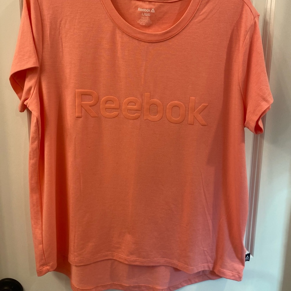 Reebok Women's Training Essentials Jersey High-Low T-Shirt Coral | Large